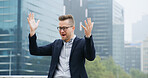 Happy, business and man with surprise in city for good news, success and travel for celebration. Smile, male person and energy for freedom goals, bonus achievement and company promotion in urban town