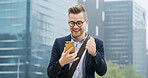 Fist pump, cellphone and businessman in city with good news, email or job promotion with happiness. Smile, celebration and male financial manager with phone for investment approval in urban town.