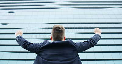 Buy stock photo Success, cheering and back of businessman in city for career growth, promotion and winner. Celebration, professional goals and freedom with low angle of person for target, good news and bonus