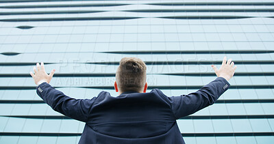 Buy stock photo Success, winner and back of business man in city for career growth, promotion and cheering. Celebration, professional goals and freedom with low angle of person for target, good news and energy