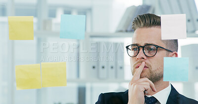 Buy stock photo Glass wall, sticky notes and thinking with business man in office for brainstorming or strategy. Development, planning and vision with employee at work for problem solving or solution on storyboard