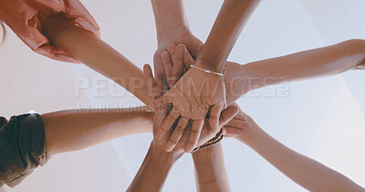 Buy stock photo Hands, stack and team at office with low angle, support or solidarity for goal in circle at startup. People, group and huddle at workplace for celebration, success or collaboration at creative agency