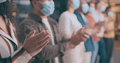 Buy stock photo Applause, face mask and hands of business people in office for achievement, motivation or success. Celebration, crowd and support with employee team in PPE, clapping for bonus, goals or target