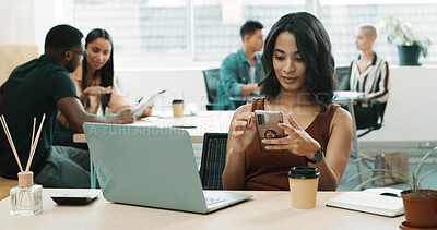 Buy stock photo Phone, laptop and businesswoman in office for networking, contact or communication with coffee. Coworking, computer and female creative editor with cellphone for research on mobile app in workplace.