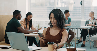 Buy stock photo Phone, laptop and businesswoman in office with coffee for networking, contact or communication. Coworking, computer and female creative editor with cellphone for research on mobile app in workplace.