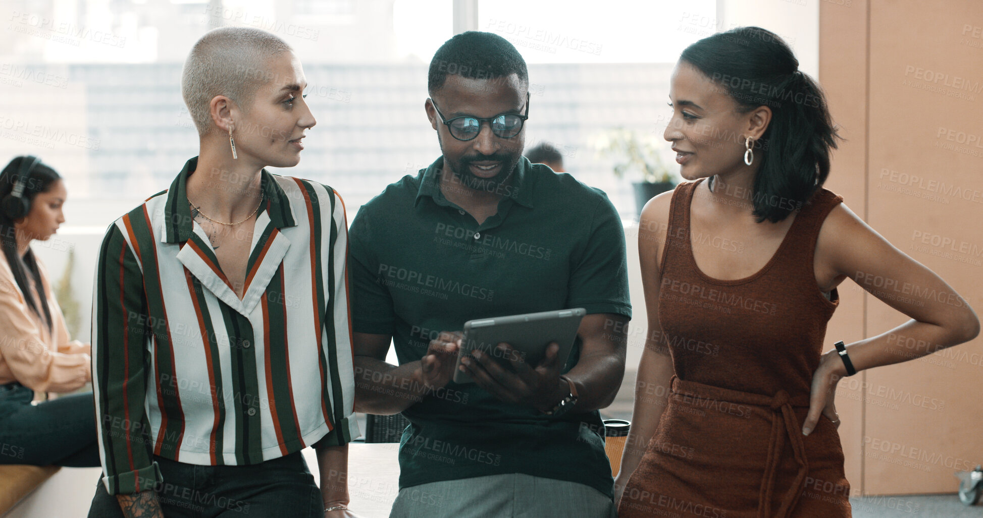 Buy stock photo Creative, people and tablet at office with discussion for social media marketing, ad campaign or collaboration. Employees, planning and team checking online engagement for brand awareness in meeting