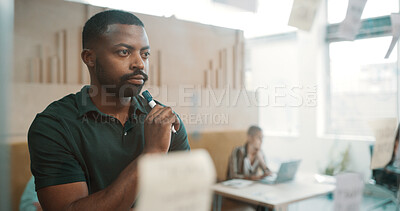 Buy stock photo Thinking, man and glass for planning with ideas, schedule or insight for project management in office. Brainstorming, strategy and male employee by board for decision, agenda and vision at workplace