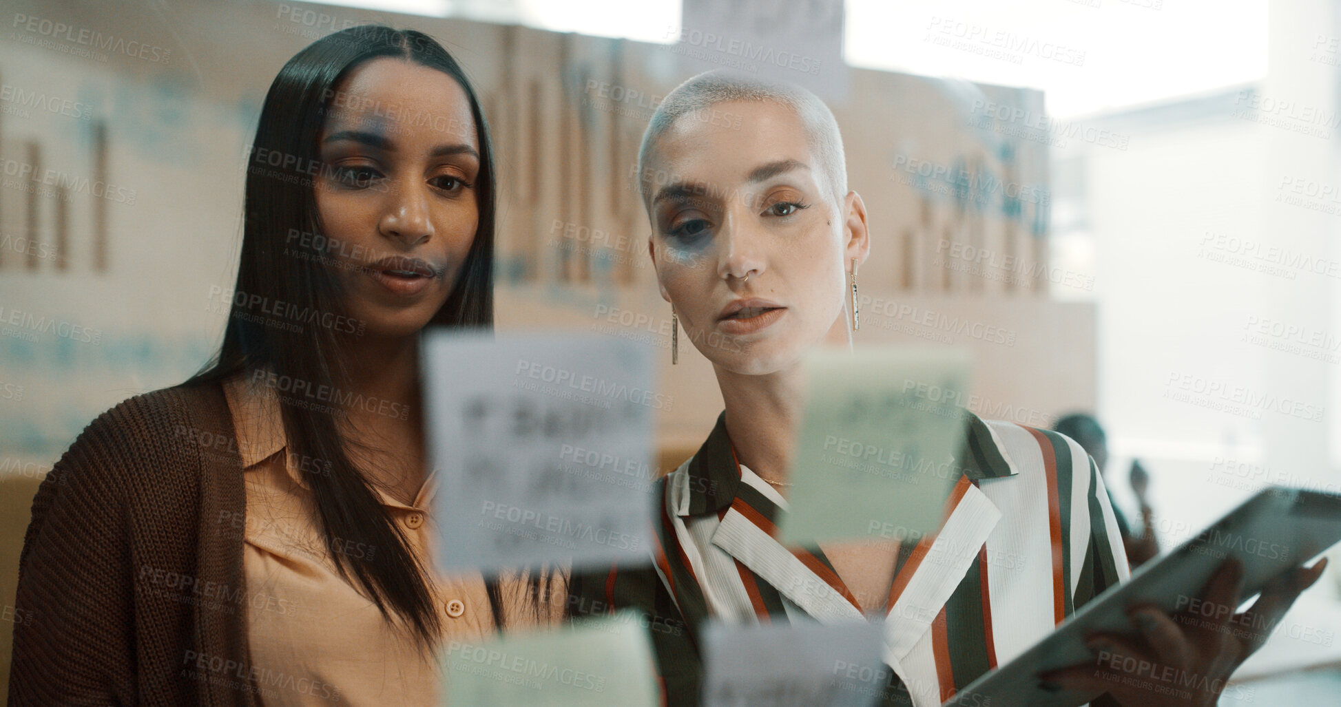 Buy stock photo Business, women and brainstorming by glass with tablet for research, sticky note and team discussion. Info, schedule or agenda with female people planning, partner and tech for project management