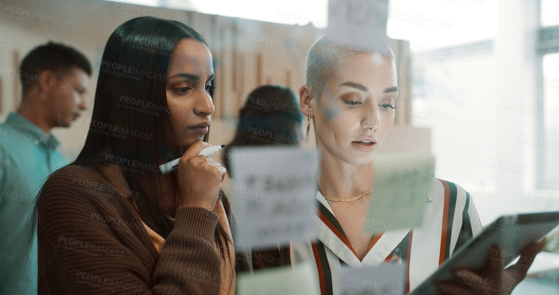 Buy stock photo Team, women and brainstorming by glass with tablet for research, sticky note and creative thinking. Info, schedule or vision with people planning, partner insight and tech for project management