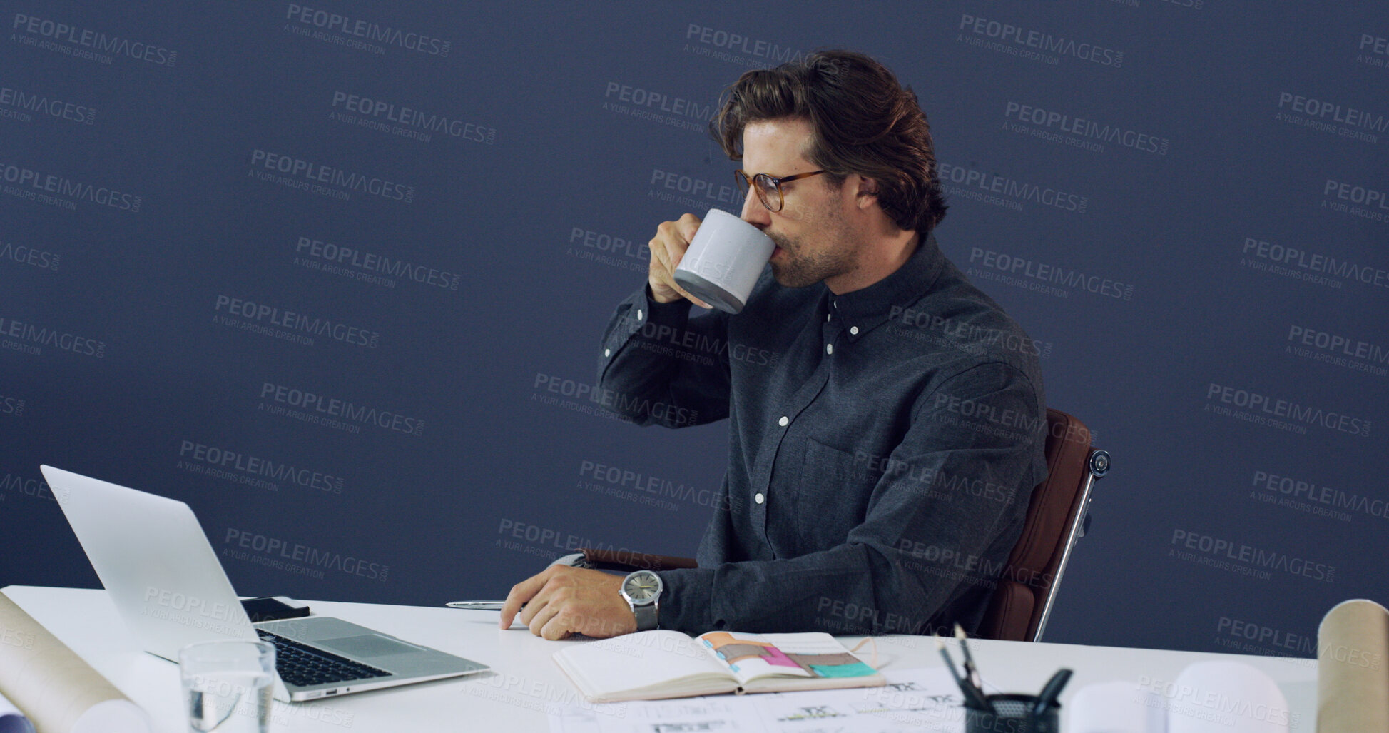 Buy stock photo Laptop, coffee break and architect with notebook, blueprint and research of engineer in office. Reading, drink and planning with architecture notes for construction project with design for contractor