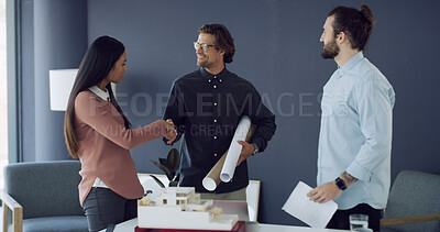 Buy stock photo Business people, smile and handshake with blueprint, documents or architecture model in office. Men, woman and meeting for design, engineering team and welcome or approval for 3D building prototype