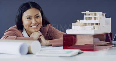 Buy stock photo Portrait, woman and architect with model in office for career pride, about us and building design. Person, happiness and 3d prototype of project planning, property development and expansion structure
