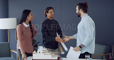Buy stock photo Architecture, handshake or designers with floor plan for building deal, teamwork or offer. People, shaking hands or property developer in meeting with contractor, engineer or real estate agreement