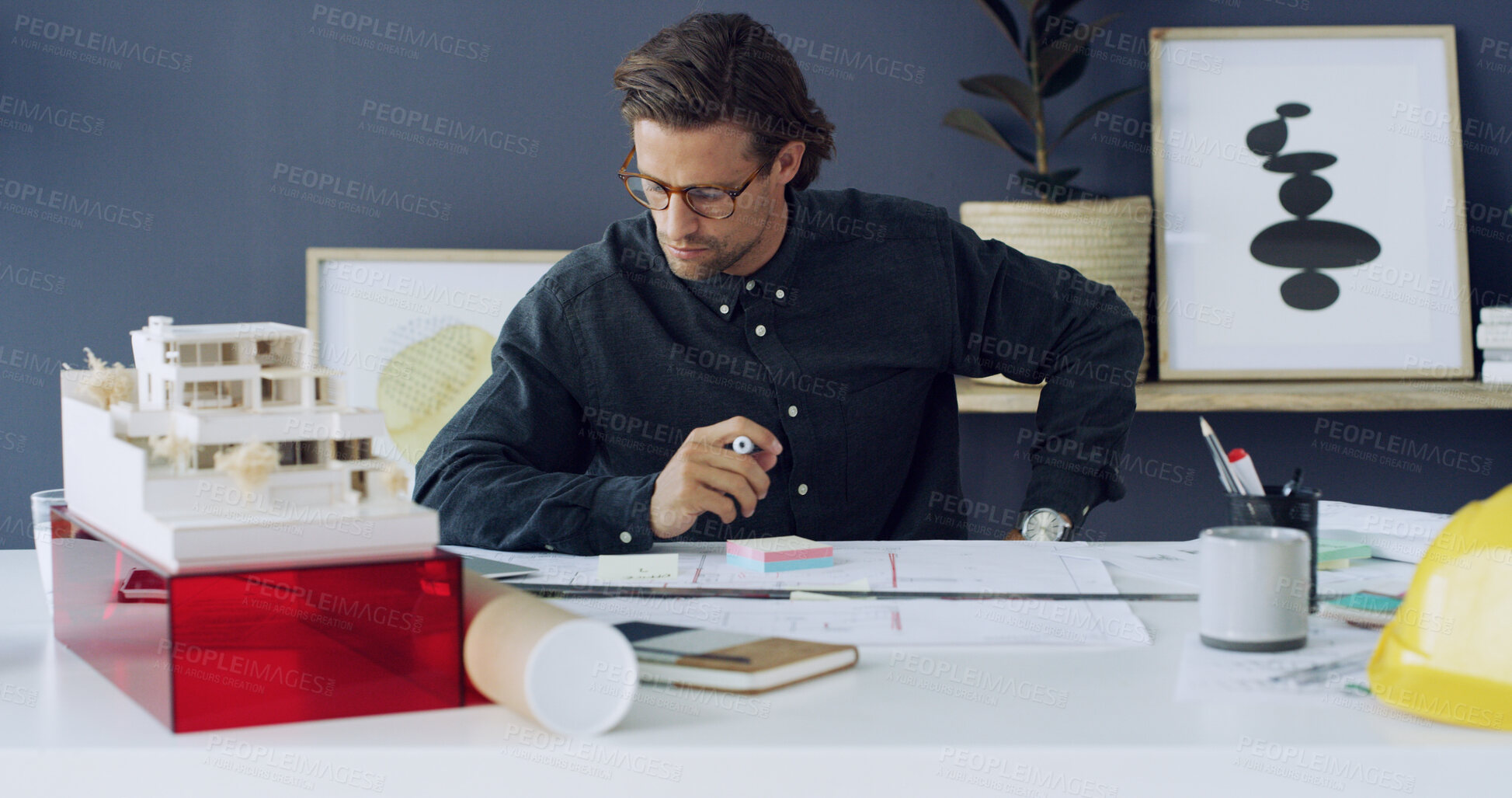 Buy stock photo Thinking, man and architect with blueprint in office for sketch, building ideas and design update. Male person, review and floor plan information, project planning and notes for property development

