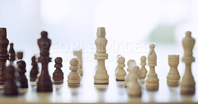 Buy stock photo Chess, strategy and contest with board games in home for knowledge, problem solving and challenge. Checkmate, tournament and versus with toy and king piece on chessboard for hobby and competition