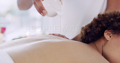 Buy stock photo Hands, masseuse and oil on person for back massage, muscle tension and luxury treatment. People, serum and cosmetic therapy for body wellness, skincare healing and pamper customer for health benefits