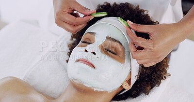 Buy stock photo Hands, face and cucumber with clay mask at spa, beautician and woman with natural skincare and wellness. Facial, treatment and beauty with organic product, moisturizing and skin detox at resort