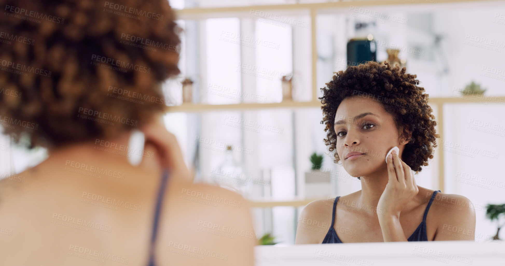 Buy stock photo Girl, mirror and cotton pad for beauty in home, cleaning or hygiene with makeup removal or skin toner. Self care, routine and African woman at house with reflection for dermatology and skincare