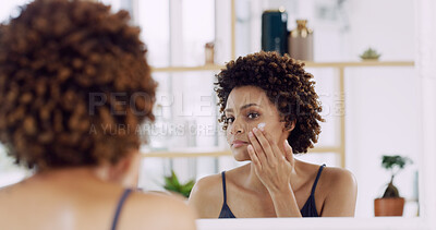 Buy stock photo Apply, moisturizer or African woman with mirror in home for natural beauty or lotion. Reflection, glow or afro person in house for cosmetic benefits, facial cream and treatment with shine or skincare