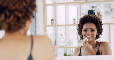 Buy stock photo Happy woman, mirror and cotton pad for skincare in home, cleaning or hygiene with makeup removal or skin toner. Self care routine, African person at house and reflection for dermatology with beauty