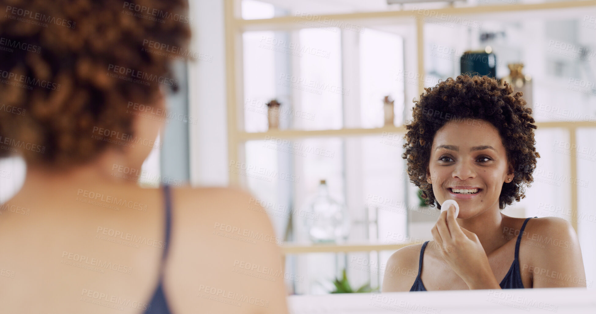 Buy stock photo Happy woman, mirror and cotton pad for skincare in home, cleaning or hygiene with makeup removal or skin toner. Self care routine, African person at house and reflection for dermatology with beauty