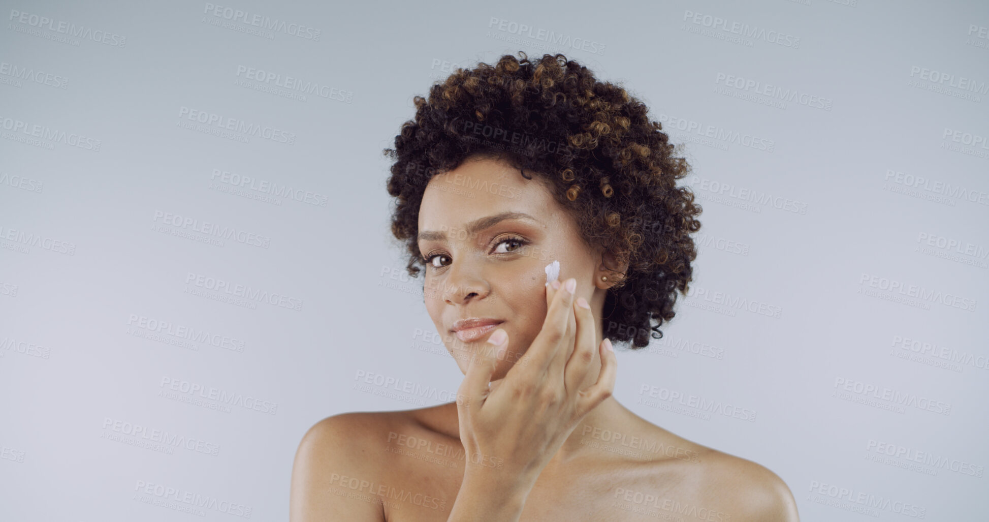 Buy stock photo Portrait, black woman and skincare for cream, lotion and skin hydration on studio background. African model, person and glow with cosmetics, mockup and dermatology treatment for natural beauty