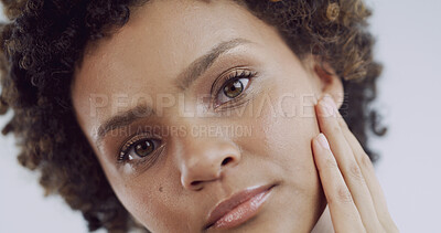 Buy stock photo Beauty, touch and portrait of woman in studio for skincare, collagen and dermatology. Glow, self care and clear skin with African person on white background for grooming, aesthetic and shine