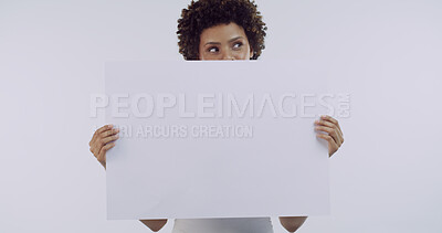 Buy stock photo Woman, poster and thinking in studio with skincare, mockup space and afro on white background. African girl, model and blank sign for advertising, cosmetic or natural glow with dermatology for beauty