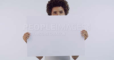 Buy stock photo Girl, poster and studio portrait with promotion, mock up space and afro on white background. African woman, blank sign and advertising with board, sale or announcement for discount deal in Nigeria