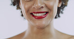 Lipstick, happy and mouth of woman in studio for red glow, beauty products and cosmetics. Smile, female model and closeup of person on white background for skincare, makeup routine or elegant glamour