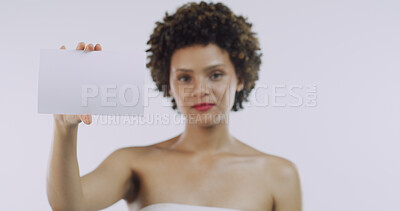 Buy stock photo Portrait, skincare or African woman with board for beauty, space or cosmetics on white background. Glow, confident or person in advertising studio with dermatology banner, promo card or poster mockup