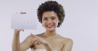 Buy stock photo Portrait, beauty and woman with board for skincare, space or cosmetics on white background. Pointing, smile or female person in advertising studio with dermatology banner, promo card or poster mockup