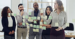 Sticky notes, thinking and business people writing in office with planning for company budget report. Brainstorming, glass wall and finance managers with research for investment proposal in workplace