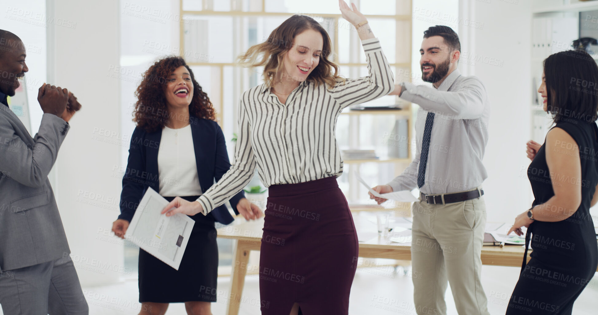 Buy stock photo Business woman, team and dancing for celebration, happy and motivation for goals at company. Excited, people or staff with documents, support and achievement for revenue increase at investment agency
