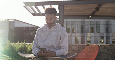 Buy stock photo City, skateboarder and man with smartphone, communication or texting with contact, online or website. Outdoor, skater and person with tech for chat, break and networking on social media and mobile