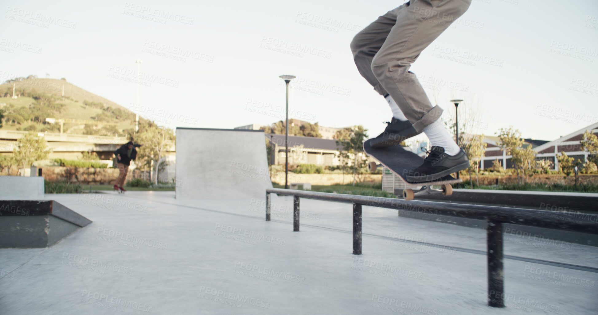 Buy stock photo Skateboard, man and legs with balance on rail for grind stunt, performance challenge and skill. Skater, person and extreme sport at skatepark for physical activity, hobby and practice action trick