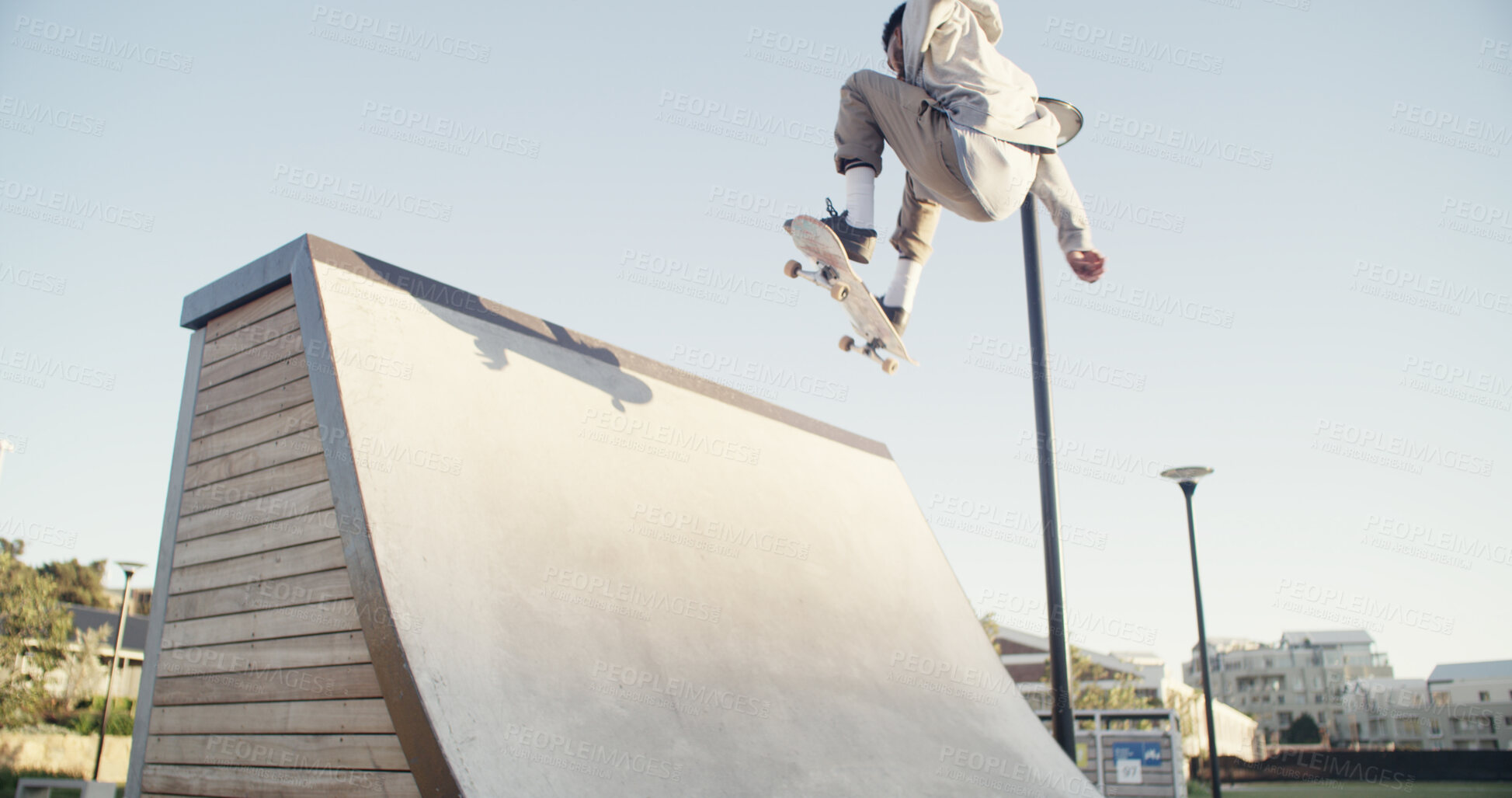 Buy stock photo Man, skateboard and ramp in city, training and fitness with freestyle practice, sports and exercise. Person, skater and talent with stunt, outdoor and workout with competition and performing action