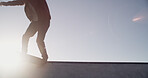 Legs, skateboard and ramp at park, sky and mockup space with balance, exercise and outdoor in summer. Person, skater and feet with training for competition, contest and low angle for extreme sports