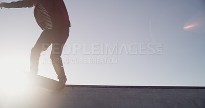 Buy stock photo Legs, skateboard and ramp at park, sky and mockup space with balance, exercise and outdoor in summer. Person, skater and feet with training for competition, contest and flare with extreme sports