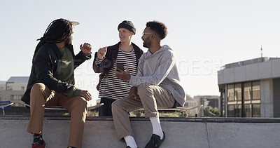 Buy stock photo Happy men, skateboard or phone with friends for social media, network or connection in city. Male people, group or community with mobile smartphone for spot or bonding together in an urban skate park