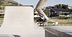Skateboard, trick or legs with balance at skatepark for grind stunt, performance challenge or skill. Skater, person or extreme sport on ledge for adventure, hobby or practice action technique at ramp