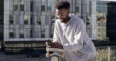 Buy stock photo City, skateboarder and man with smartphone, texting or communication with contact, online or website. Outdoor, skater and person with tech for chat, break and networking on social media and mobile