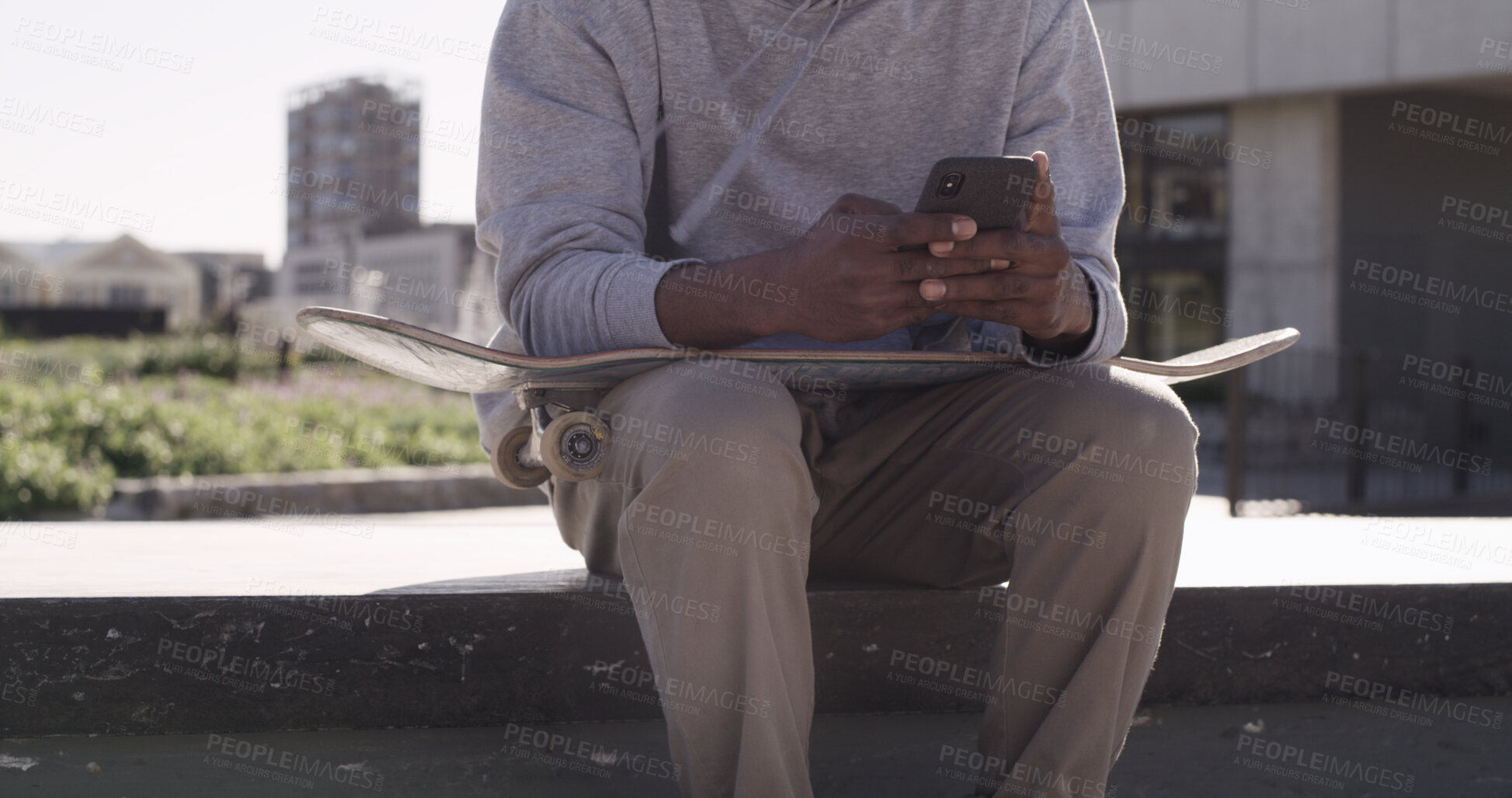 Buy stock photo City, skateboarder and hands with smartphone, texting and communication with contact, online or web. Outdoor, skater and person with tech for chat, break and networking on social media and mobile