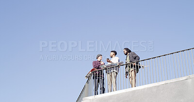 Buy stock photo Below, people and conversation with skateboard, phone and mockup on blue sky space. Together, friends and gen z skater group with tech, smile and social media for fitness hobby and break for sport