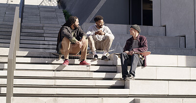 Buy stock photo Skateboard, friends and smile with men in city for conversation, chat or story on steps. Skaters, sports and outdoor together for hobby, hangout and group relax on stairs with streetwear for fashion