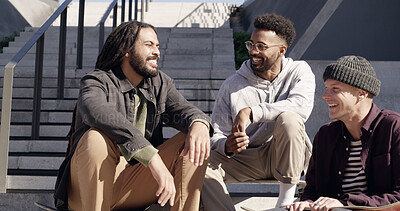 Buy stock photo Skateboard, friends and relax with men in city for conversation, funny joke or story on steps. Skaters, sports and outdoor together for laugh, hangout and group on stairs with streetwear for fashion