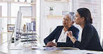 Computer, business women and team discussion for accounting, budget or mentor training intern. Screen, meeting and planning with auditor in office for bookkeeping, investment review or coaching