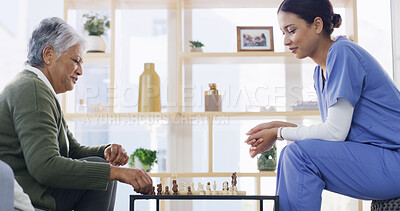 Buy stock photo Nurse, elderly woman and play chess in home, smile and solution with cognitive function. Senior person, caregiver and challenge with board game, relax and competition for brain health in retirement