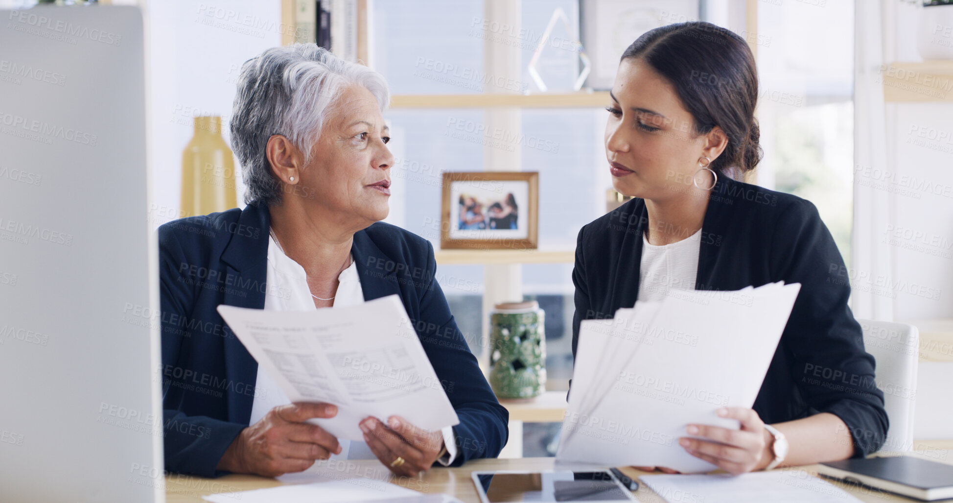Buy stock photo Mature woman, team and documents at office, discussion and administration with review at company. Business people, paperwork and feedback with proposal, mentorship and advice at insurance agency