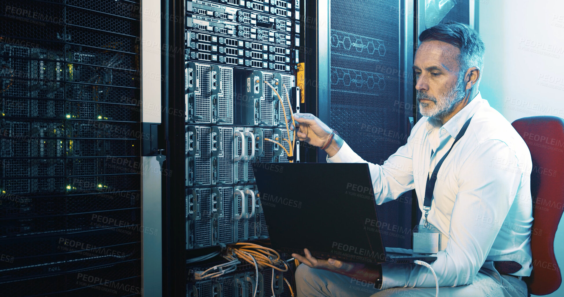 Buy stock photo Server room, programmer and man with laptop, hardware problem solving and network inspection. IT specialist, mature person and employee with pc, cyber security and tech upgrade with maintenance
